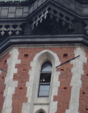 Tower with bugler playing in window